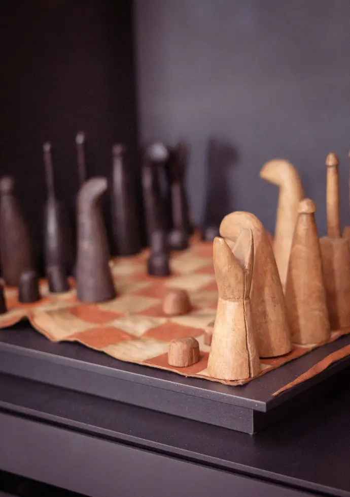 brown wooden rolling pin on brown wooden board